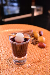 chilled cocktail glass red wine with herbal and long lychee fruit bar alcohol drink menu