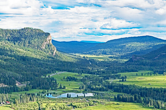 Looking west from the road leading down from Colorado's Wolf Creek Pass and into a beautiful green valley