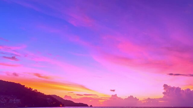 Amazing Time Lapse of colorful clouds pastel sky Sunset or sunrise cloudscape Beautiful light of nature sky and Clouds moving away rolling Colorful dark sunset clouds Footage timelapse Dramatic scene