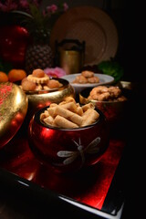 Chinese new year festival freshly baked assorted cookies group set with pineapple , almond, chocolate , walnut, peanut and spicy shrimp roll