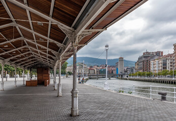 bilbao downtown with nervion river and boardwalk area, basque country, spain
