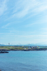 Fototapeta na wymiar cloudy blue sky and ocean in Jeju island