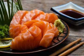 Sushi salmon & tuna sushi shrimp and wasabi on the white plate.
