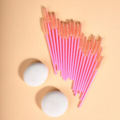 multi-colored brushes for eyelash extensions, many different brushes for lashmakers.