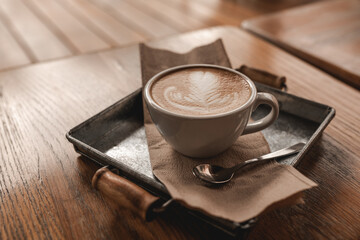 Freshly Brewed Cappuccino on Wooden Serving Tray. Happy Morning Waking Up.