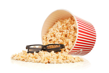 Bucket with tasty popcorn and 3D glasses on white background