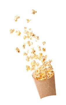 Paper bag with tasty popcorn on white background