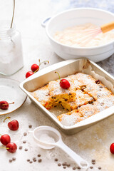 Homemade cherry sponge cake with chocolate drops