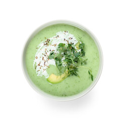 Bowl with green gazpacho on white background