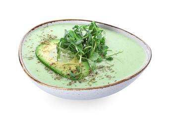 Bowl with green gazpacho on white background