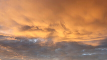 Golden Sunset, Sunset sky, sky background, picturesque sunset sky landscape with dramatic orange clouds. Sunset sky, sky background, picturesque sky