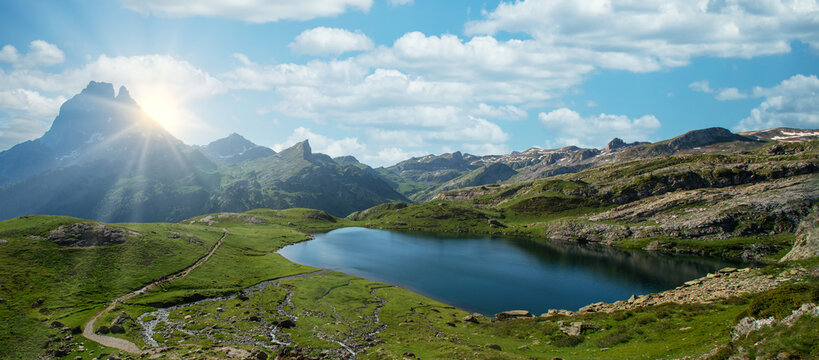 Pic du Midi Ossau and Ayous lake in french Pyrenees mountains