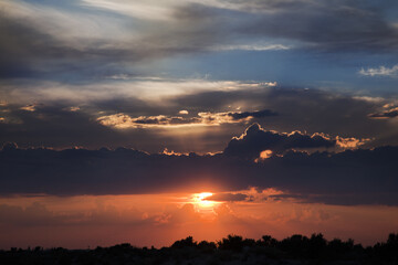 beautiful sunset with clouds and sun