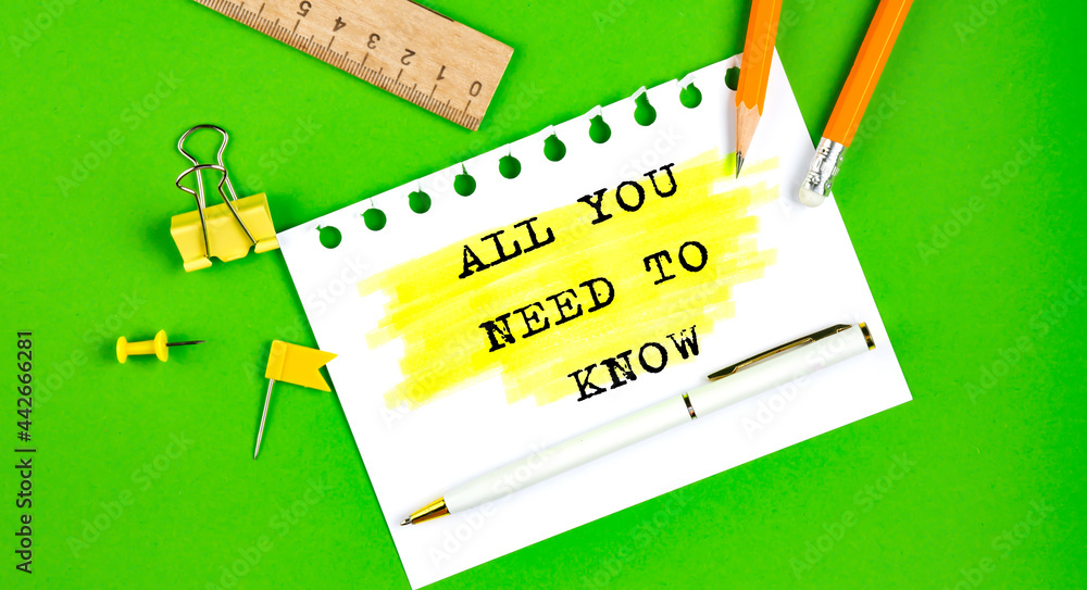 Poster text all you need to know sign showing on the green background with office tools