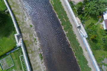 Modern flood protection wall in the style of the historic city wall. Permanent measures against...