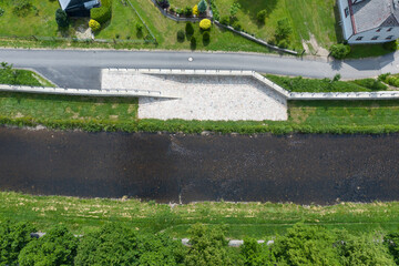 Modern flood protection wall in the style of the historic city wall. Permanent measures against...