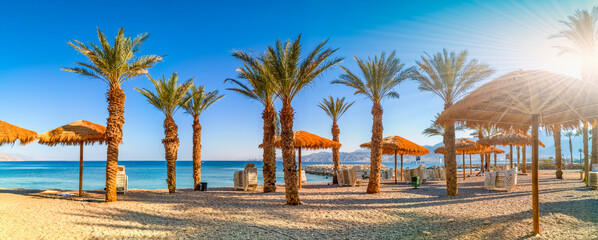 Panorama. Central public beach in Eilat - famous tourist resort and recreational city in Israel and...