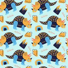 Obraz premium Vector illustration of seamless pattern with dinosaur. Colored Triceratops on a blue background. Yellow cloud and volcano. For printing on fabric and paper.