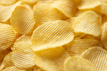 crispy golden potato chips snack texture background