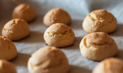 Delicious pastries on the table. Lies on white paper.