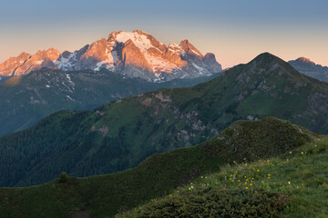 Fototapeta premium View to Marmolada. Marmolada is the highest mountain of Dolomites, situated in northeast Italy. Panoramic summer view, Dolomiti Alps, South Tyrol, Italy, Europe. Traveling concept background.