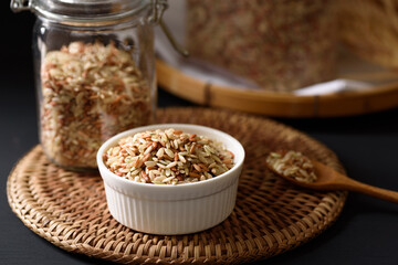 Organic brown rice harvested from the fields of northern Thailand. Rich in vitamins and fiber, which are beneficial to health. natural product concept