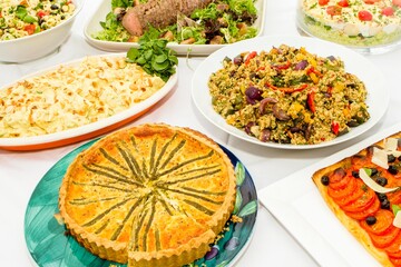 Plates of food on a white background with natural light