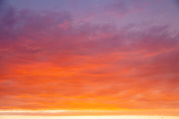 Red sky with clouds at sunset.