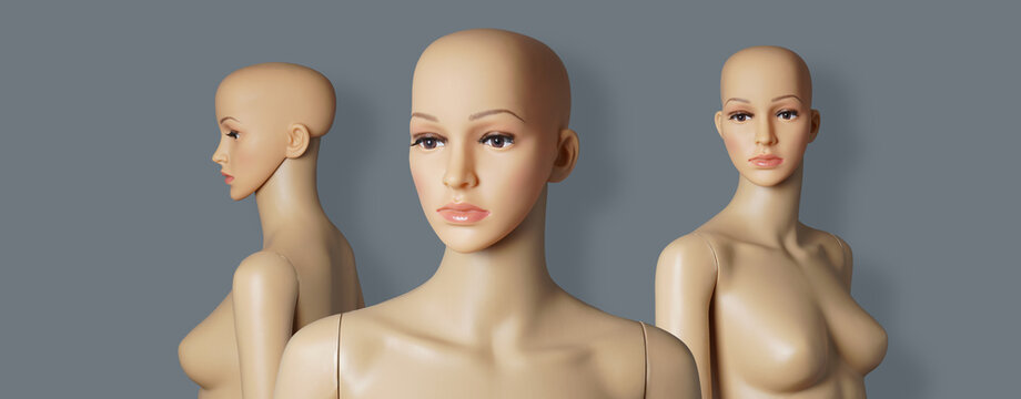 group of 3 naked and bald store window mannequins or display dummies with realistic faces