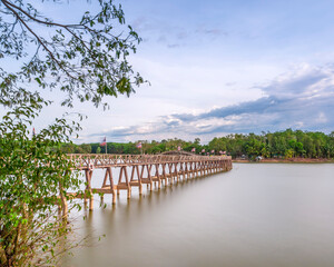 Wooden Bridge Nong Yai Tang Chang Public Park, Chumphon Thailand long exposure movement smooth water no people with copy space