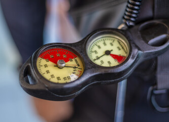 Scuba Diving Depth Gauge and Equipment on a boat in the gulf of Thailand with copy space no people