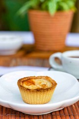 Egg Tart on Wooden Background