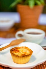 Egg Tart on Wooden Background
