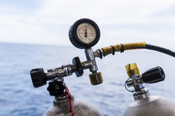 Scuba Diving Tanks Compressor 
 on a Gas Tank Diving Equipment on a dive boat in the gulf of...