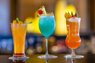 Cocktails on a bar top in a restaurant close up no people