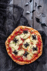 Ideas for Halloween. Margarita Pizza with olives spiders.