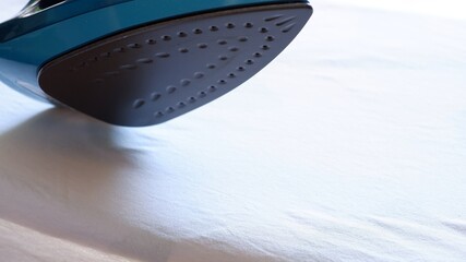 Blue iron when ironing white fabric