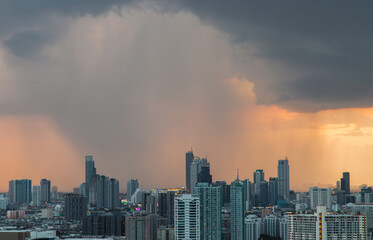 Obraz premium Bangkok, Thailand - Jun 20, 2021 : Aerial view of Beautiful scenery view of Skyscraper Evening time before Sunset creates relaxing feeling for the rest of the day. Selective focus.
