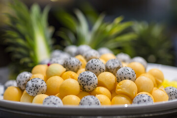 Balls of Fruit on a White Plate