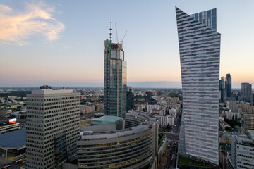 Warszawa - centrum miasta, zachód słońca, wieżowce widziane z drona - obrazy, fototapety, plakaty