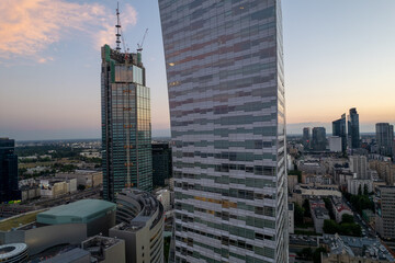 Warszawa - centrum miasta, zachód słońca, wieżowce widziane z drona - obrazy, fototapety, plakaty