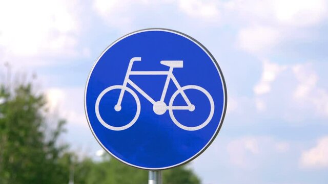 Bicycle path road sign in 4k slow motion 60fps