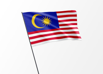 Malaysian flag flying high in the isolated background Malaysian independence day