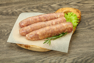 Raw pork meat sausages for grill