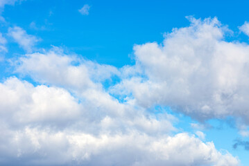 Obraz premium blue sky with white beautifull clouds background.closeup