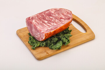 Beef ham piece over board