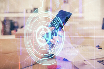 Double exposure of man's hand holding and using a digital device and data theme drawing. Technology concept.