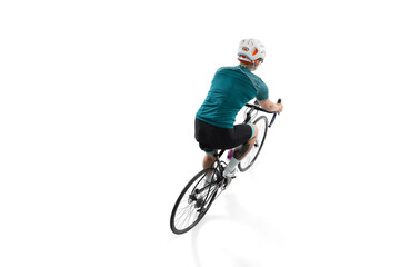 Young professional female bike rider on road bike isolated over white background.