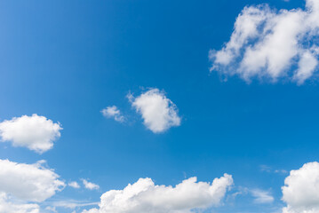 Naklejka na ściany i meble Blue sky white cloud fluffy gray clouds.dramatic blue sky,clouds warm summer day background.