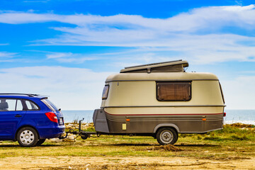 Obraz na płótnie Canvas Caravan trailer camping on coast, Spain.